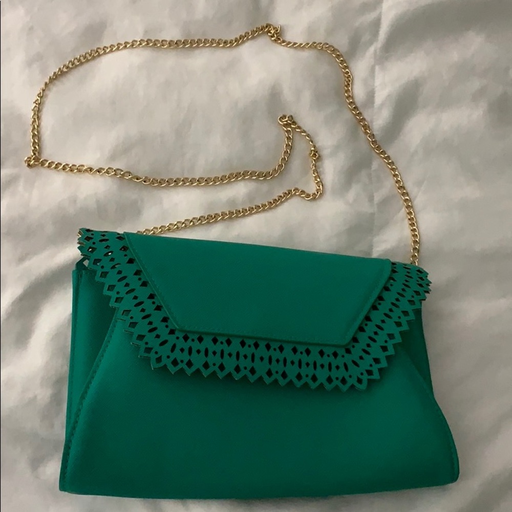 Scalloped green purse